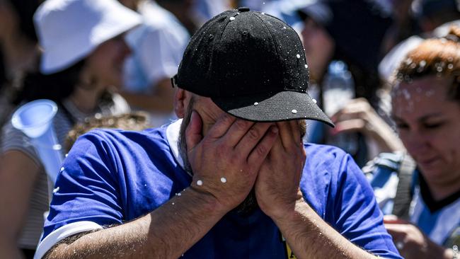 An Argentina fan in tears in Buenos Aires.