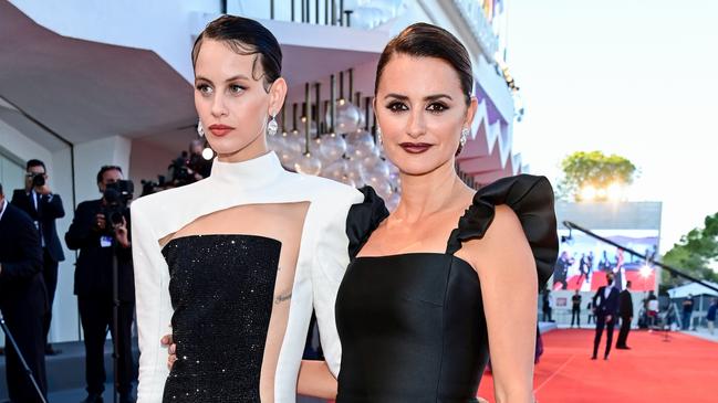 Upcoming actor and fashion muse Milena Smit, left, with Penelope Cruz on the Venice Film Festival red carpet. Picture: Getty Images