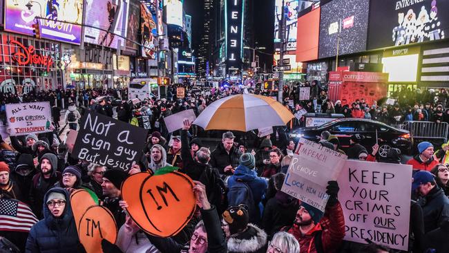 Peroteters rally in Times Square. Picture: Getty Images.