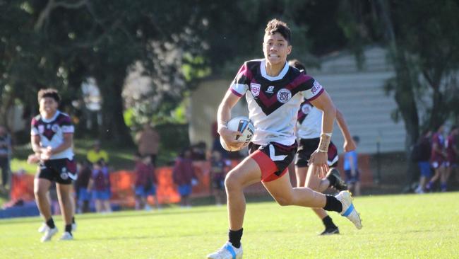 Marsden SHS’s Walker Taualupe on the way to scoring.