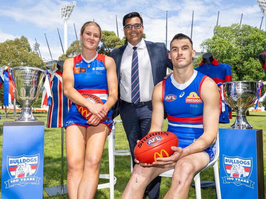 Sam Darcy (R), Ameet Bains (C) and Issy Grant (L) launch the Western Bulldogs 100 year anniversary. Picture: Brendan Beckett