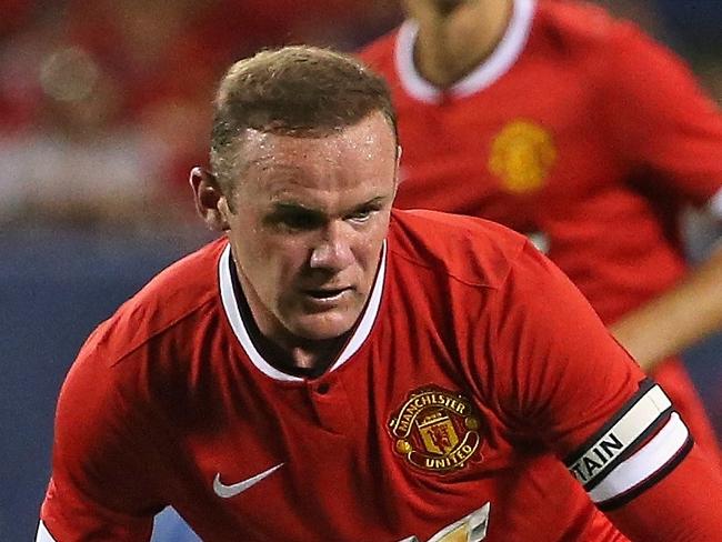 CHICAGO, IL - JULY 29: Wayne Rooney #10 of Manchester United passes against Paris Saint-Germain during a match in the 2015 International Champions Cup at Soldier Field on July 29, 2015 in Chicago, Illinois. Paris Saint-Germain defeated Manchester United 2-0. Jonathan Daniel/Getty Images/AFP == FOR NEWSPAPERS, INTERNET, TELCOS & TELEVISION USE ONLY ==