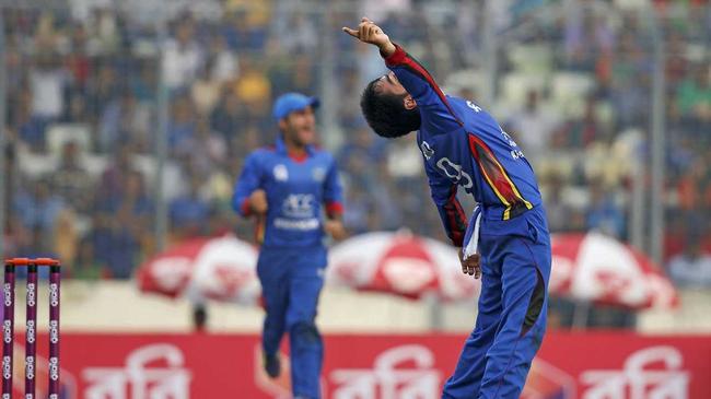 Afghanistan&#39;s Rashid Khan celebrates after claiming a wicket during a one-day international. Picture: A. M. Ahad