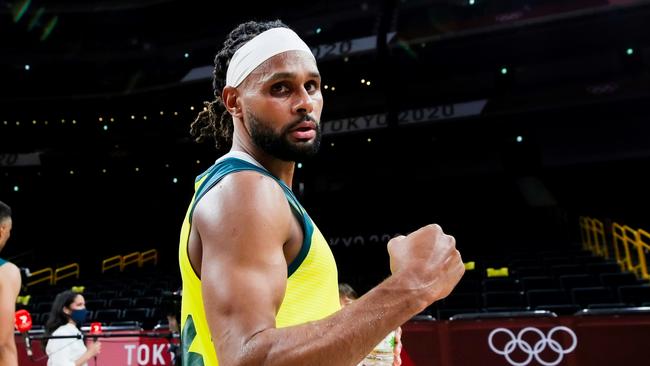 Patty Mills of Team Australia encourages a never-say-die fighting spirit in his teammates. Picture: Getty Images