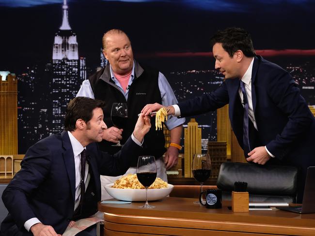 Jackman was pretty excited to dig into a giant bowl of pasta and a glass of wine.