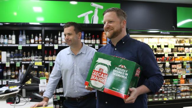 Labor leader Dean Winter and Labor member for Pembroke Luke Edmunds at Howrah Bottle Shop after complaints from industry over the Rockliff government's proposed container deposit scheme which is the most expensive in the country and will add a $6.50 cost to a 30 pack of beer. Picture: Elise Kaine