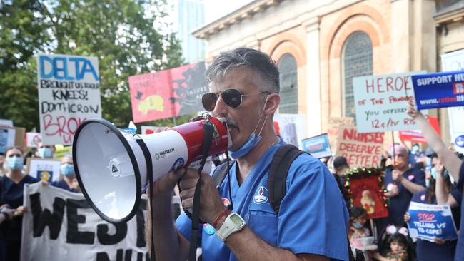 Nurses from across Sydney gathered in front of NSW Parliament today to protest staff shortages and wages. Picture: NCA NewsWire / David Swift