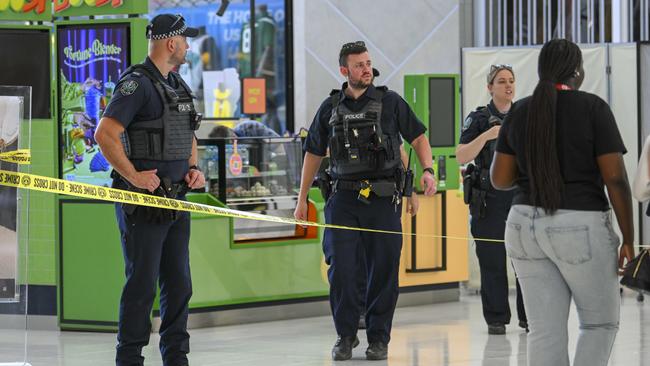 Police guard the crime scene of the stabbing at Elizabeth Shopping Centre. Picture: Mark Brake