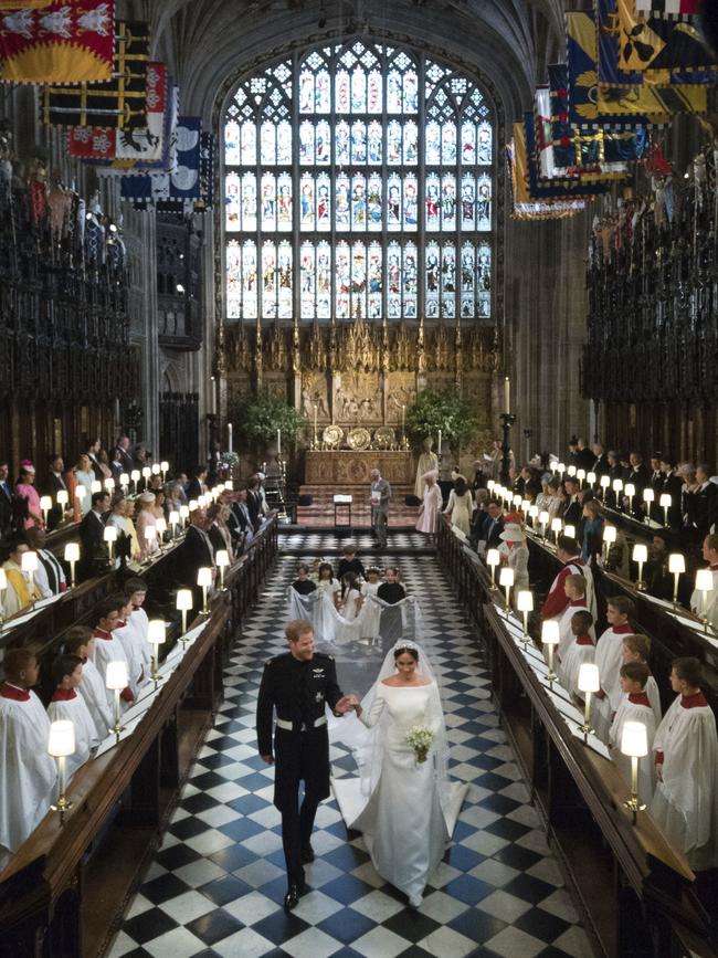 The newlyweds during their procession out of the church. Picture: AP