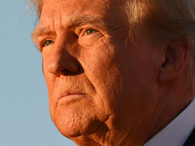 TOPSHOT - Former US President and Republican presidential candidate Donald Trump speaks during a campaign rally at site of his first assassination attempt in Butler, Pennsylvania on October 5, 2024. (Photo by Jim WATSON / AFP)