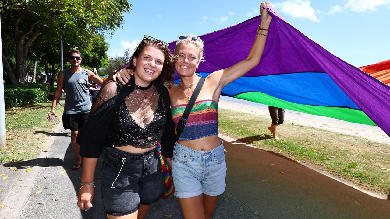 Mendy Van Dort and Jeske De Boer marched along the Cairns Esplanade with a huge rainbow flag for the Pride Stride on Saturday, part of the 2024 Cairns Pride Festival. Picture: Brendan Radke