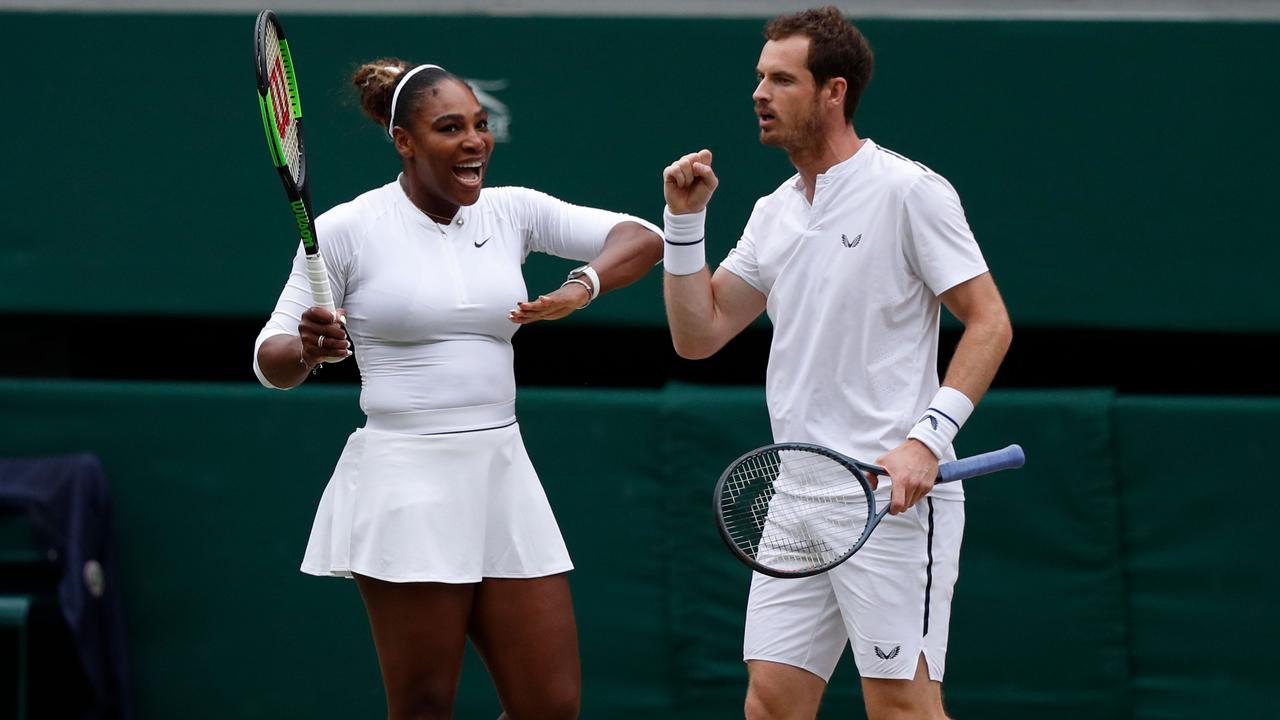Britain's Andy Murray (R) and US player Serena Williams (L) celebrate.
