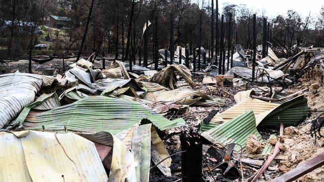 The remains of several shops and businesses which were all destroyed by the New Year’s Eve bush fire in Mogo. Picture: AAP Image/James Gourley