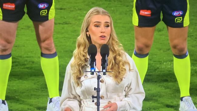 Liliya Butonova singing the national anthem pre-match. Photo: Fox Footy