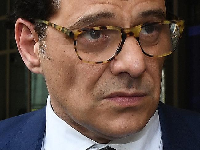 Australian actor Vince Colosimo leaves the Melbourne Magistrates Court in Melbourne, Friday, November 3, 2017. Colosimo was fined $3500 and had his licence cancelled after he was caught driving under the influence of ice. (AAP Image/Julian Smith) NO ARCHIVING