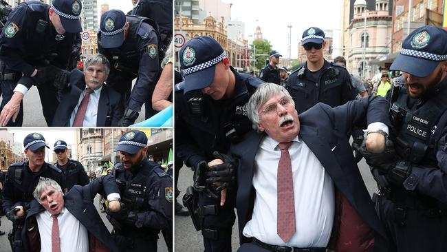 Police approach Mr Wolterding to move him from his seated protest and swiftly place both of his hands in a tight wrist lock which led to the 75-year-old suffering an injury to his arm. Picture: Richard Dobson.