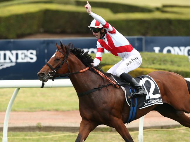 SYDNEY, AUSTRALIA - NOVEMBER 04: Joshua Parr riding Obamburumai wins Race 8 James Squire Golden Eagle during Sydney Racing at Rosehill Gardens on November 04, 2023 in Sydney, Australia. (Photo by Jason McCawley/Getty Images)