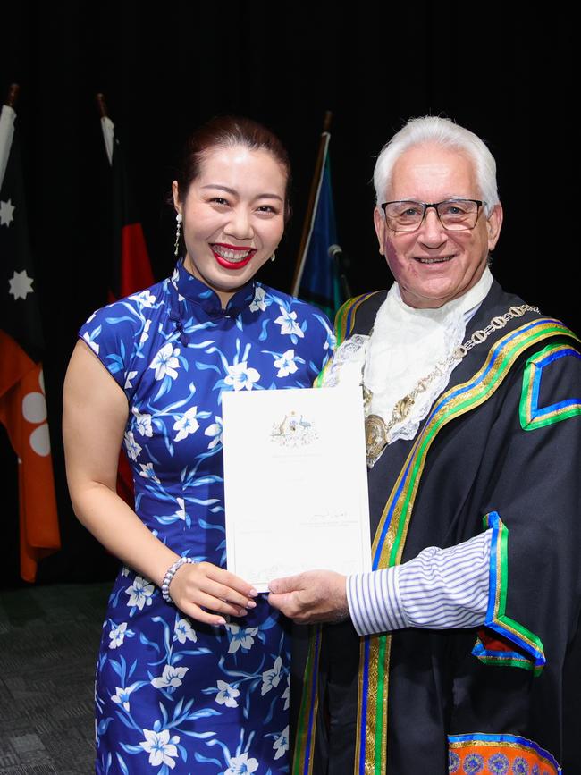 Sunny Liu received her citizenship certificate from the mayor. Picture: Supplied (George F Photo)