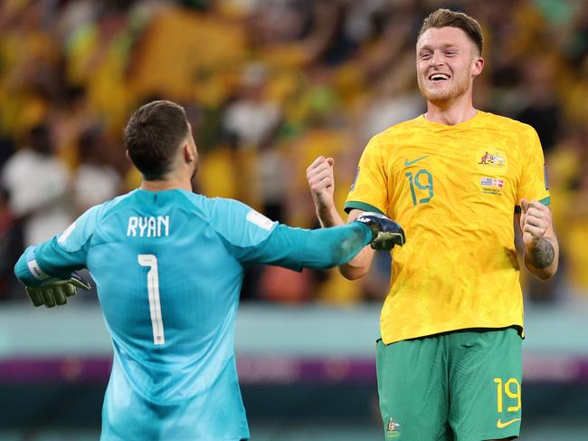 Harry Souttar (R) and Mathew Ryan of Australia celebrate their 1-0 victory and a historic Round of 16 berth. Picture: Dean Mouhtaropoulos/Getty Images