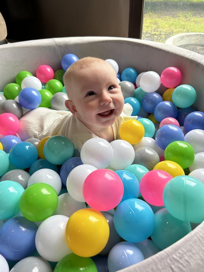 Parker Savige, nine months old. Parker is the buggiest social little butterfly, she will smile at everyone. When taking her to the shops she will stare people down untill they look at her just so she can get attention, smile and laugh at them. She is so bubbly and full of attitude.