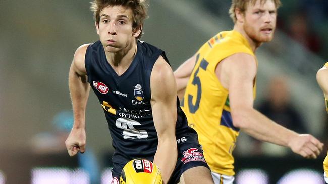 SANFL - South Adelaide v Eagles in The Elimination Final at Adelaide Oval. Joel Cross looks to handpass. Photo Sarah Reed.