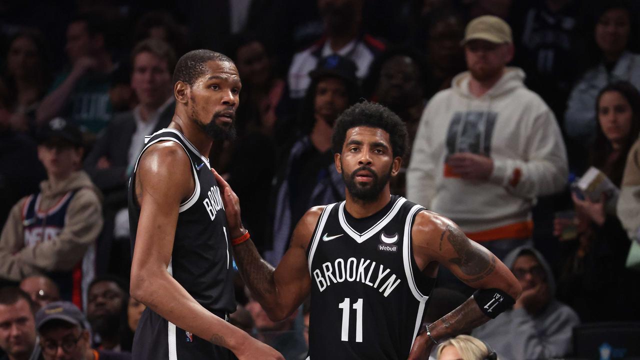 NEW YORK, NEW YORK - APRIL 23: Kevin Durant #7 and Kyrie Irving #11 of the Brooklyn Nets look on in the final seconds of their 109-103 loss against the Boston Celtics during Game Three of the Eastern Conference First Round NBA Playoffs at Barclays Center on April 23, 2022 in New York City. NOTE TO USER: User expressly acknowledges and agrees that, by downloading and or using this photograph, User is consenting to the terms and conditions of the Getty Images License Agreement. Al Bello/Getty Images/AFP. == FOR NEWSPAPERS, INTERNET, TELCOS &amp; TELEVISION USE ONLY ==