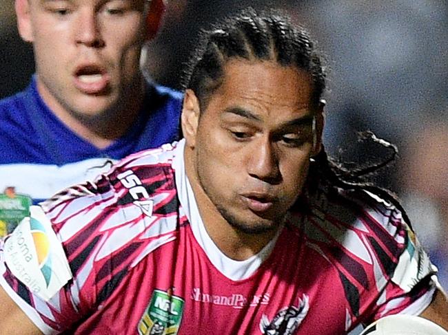 Martin Taupau of the Sea Eagles evades a tackle by Ofahiki Ogden (left) and Josh Jackson of the Bulldogs during the Round 22 NRL match between the Manly-Warringah Sea Eagles and the Canterbury-Bankstown Bulldogs at McGrath Foundation Stadium, known as Lottoland, in Sydney, Saturday, August 11, 2018. (AAP Image/Dan Himbrechts) NO ARCHIVING, EDITORIAL USE ONLY