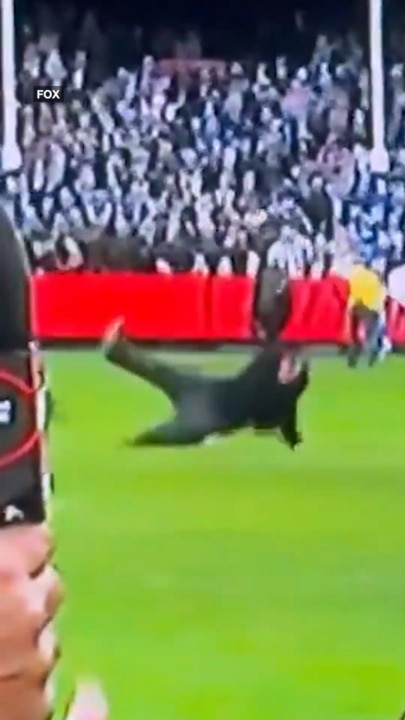 Drama as person goes sliding behind Fox Footy commentators