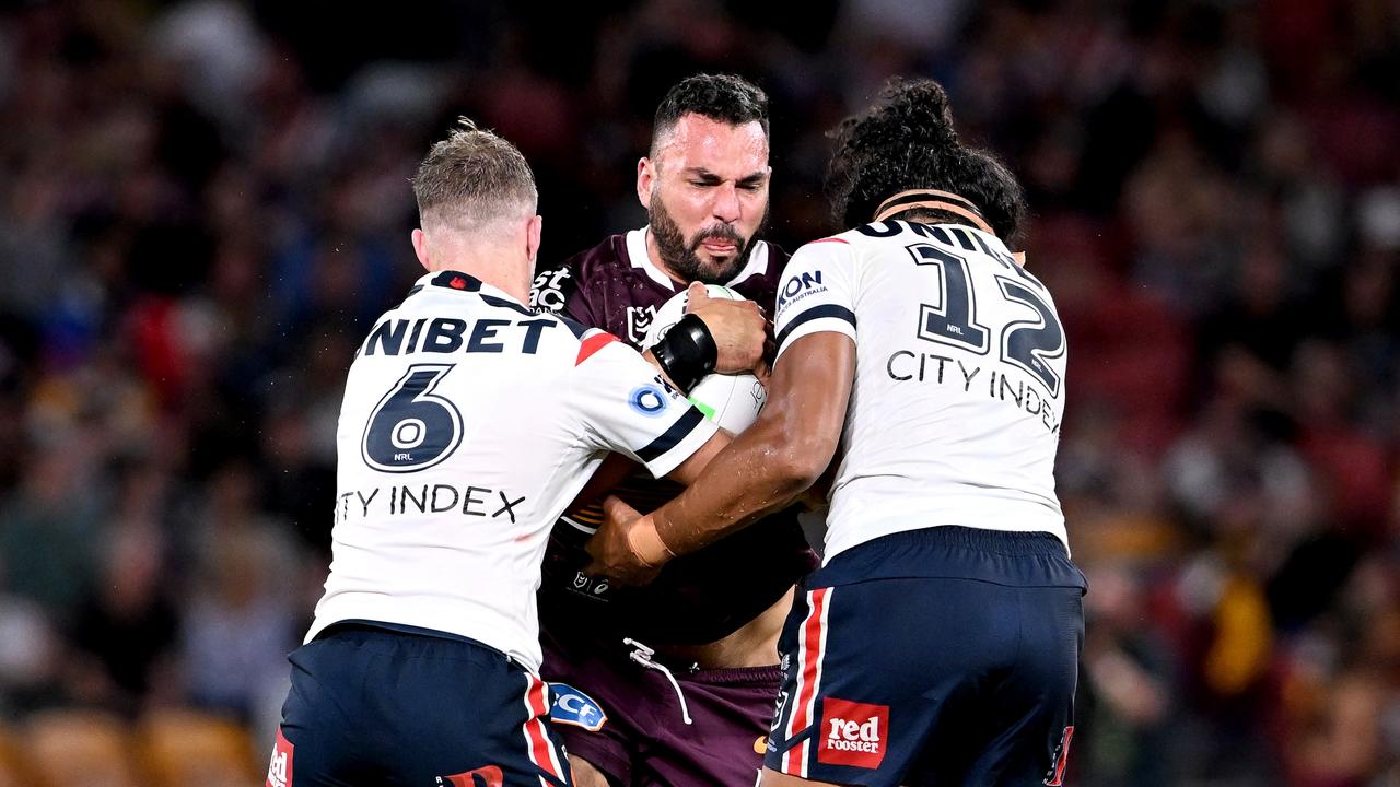 BRISBANE, AUSTRALIA - APRIL 08: Ryan James of the Broncos takes on the defence during the round five NRL match between the Brisbane Broncos and the Sydney Roosters at Suncorp Stadium, on April 08, 2022, in Brisbane, Australia. (Photo by Bradley Kanaris/Getty Images)