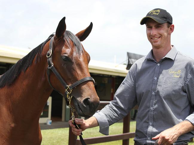 Bart McCulloch  from Grenville Stud with Lot 264 at the Magic Millions sales Complex at Bundall. Picture Glenn Hampson