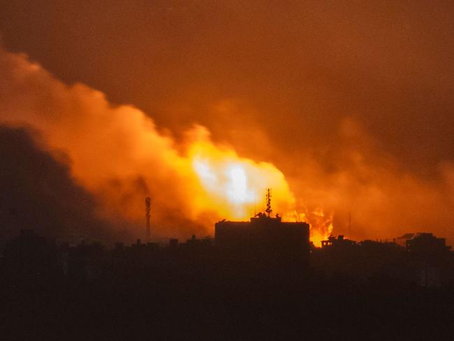 Smoke and fire rising over the Palestinian enclave during an Israeli strike. Picture: AFP