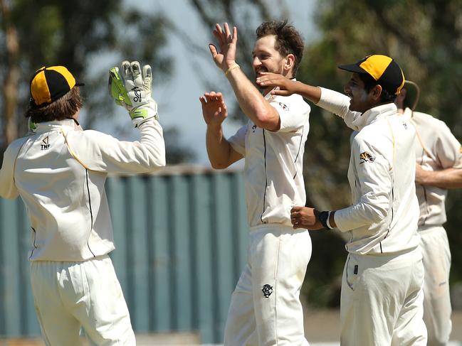 Blade Baxter celebrates one of his 10 wickets. Picture: Hamish Blair