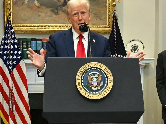 (FILES) US President Donald Trump speaks in the Roosevelt Room flanked by  Masayoshi Son (2R), Chairman and CEO of SoftBank Group Corp, Larry Ellison (2L), Executive Charmain Oracle and Sam Altman (R), CEO of Open AI at the White House on January 21, 2025, in Washington, DC. OpenAI chief executive Sam Altman on January 27, 2025 praised the recent debut of Chinese rival DeepSeek's latest artificial intelligence market, saying that it was "invigorating to have a new competitor." In a social media post, Altman called DeepSeek's R1 "an impressive model, particularly around what they're able to deliver for the price." (Photo by Jim WATSON / AFP)