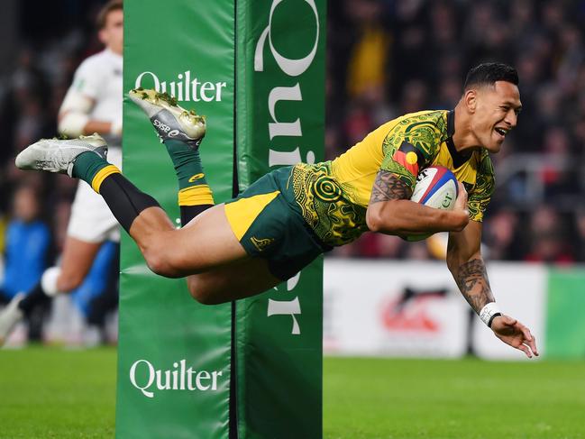 Australia's fullback Israel Folau scoring a try during the international rugby union Test match between England and Australia. Picture: AFP