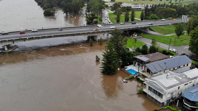 Sydney continues to be drenched in heavy rains causing flooding in local areas and the Warragamba Dam to overflow, sending millions of litres of water down the Nepean River to low lying areas like Emu Plains. Homes along Bellevue Rd in Regentville under threat from rising flood waters.  Picture: Toby Zerna