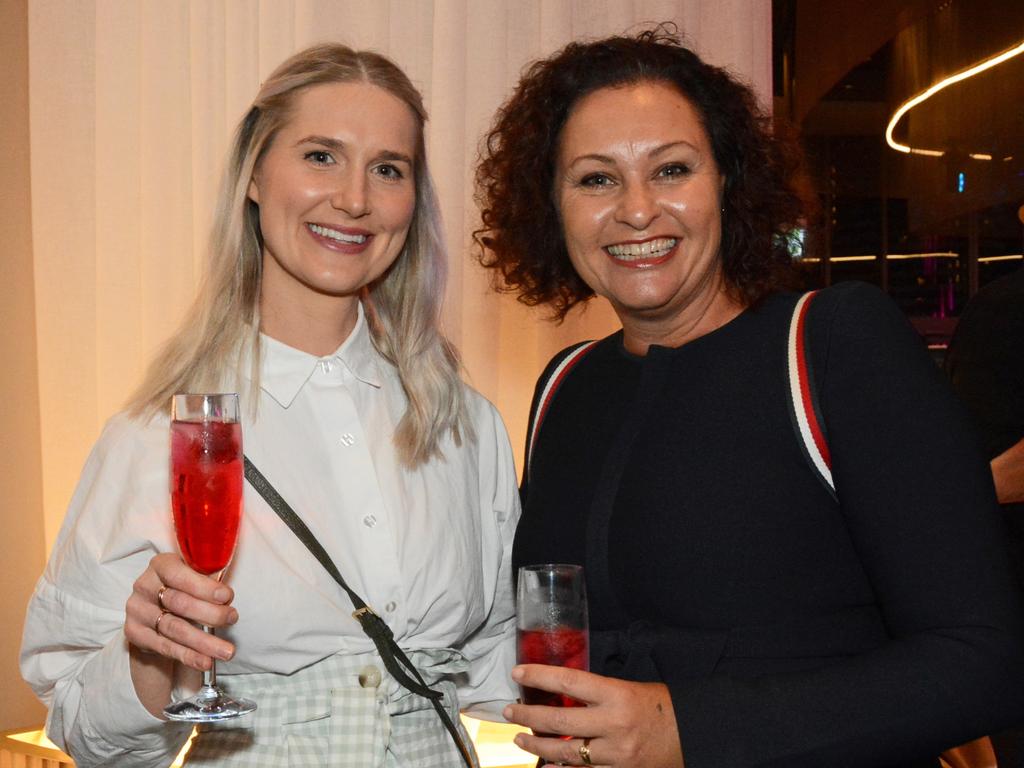 Kate Osborn and Anna Newbauer at the YPGC cocktail party in the Atrium Bar, The Star Gold Coast. Picture: Regina King.