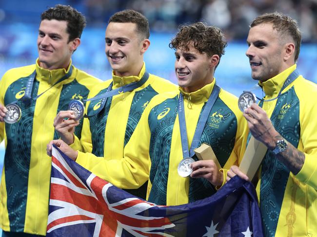 NANTERRE, FRANCE - JULY 27: Silver Medalists, Jack Cartwright, Flynn Southam, Kai Taylor and Kyle Chalmers of Team Australia pose with their medals following the Medal Ceremony after the Men's 4x100m Freestyle Relay Final on day one of the Olympic Games Paris 2024 at Paris La Defense Arena on July 27, 2024 in Nanterre, France. (Photo by Al Bello/Getty Images)