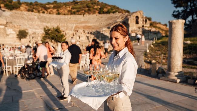 Seabourn guests can enjoy a glass of wine at the ruins of Ephesus.