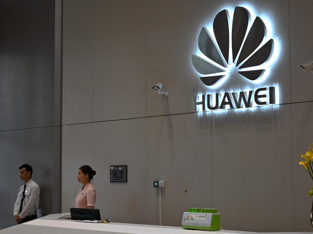 A company logo is displayed at a reception area at the Huawei headquarters in Shenzhen, China's Guangdong province. Picture: AFP