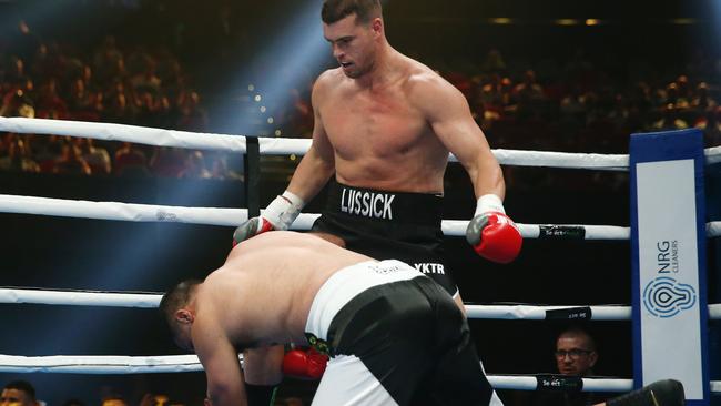 Darcy Lussick finished off Justin Hodges in on time. Photo: AAP Image/Brendon Thorne