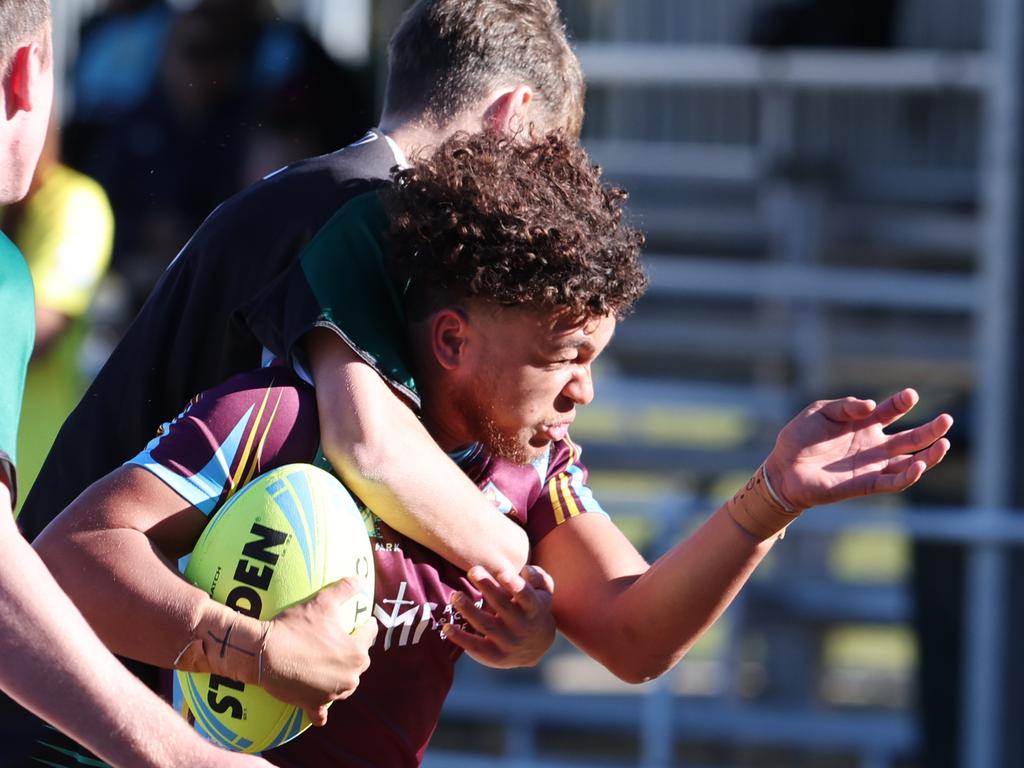 Titans Cup Finals. Tweed River High (green and Black) v Keebra Park (blue) in Open Boys Development division at Southport Tigers . Picture Glenn Hampson.