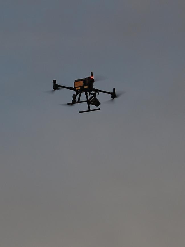 A drone is dispatched to assess damage. Picture: John Grainger