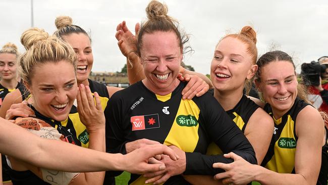 Jess Hosking, Courtney Wakefield, Grace Egan and Beth Lynch enjoy their latest win.