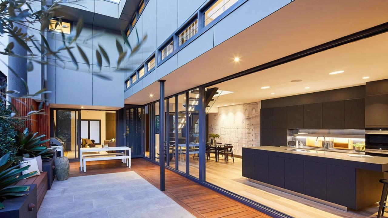 A landscaped barbecue courtyard accessed from the ground floor living spaces. Picture: realestate.com.au