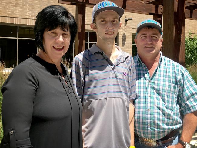 Bradie with his mum Sharon and dad Mick, leaving hospital after three-long weeks of recovering. Picture: Supplied