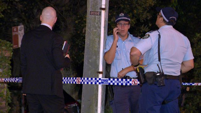 Police moments after the fire attack in Woollahra in Sydney's east. Picture: Scene Bondi