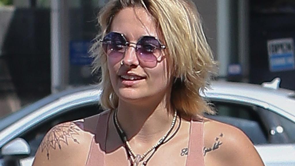 Paris Jackson flashes a glimpse of her nipple piercings while out in Venice...