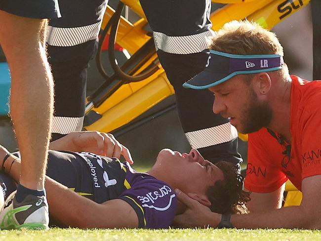 MELBOURNE, AUSTRALIA - FEBRUARY 23: Hugo Peel of the Storm receives medical attention after a collision during the 2025 NRL Pre-Season Challenge match between Melbourne Storm and North Queensland Cowboys at Casey Fields on February 23, 2025 in Melbourne, Australia. (Photo by Morgan Hancock/Getty Images)