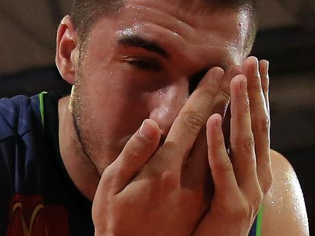 Townsville crocs player Mirko Djeric, grimaces after being injured during the match against Cairns Taipans, Convention Centre. PICTURE: JUSTIN BRIERTY