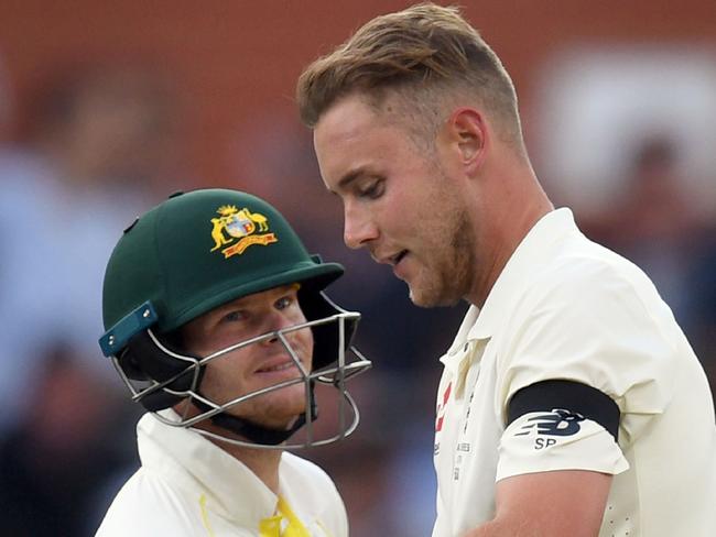 Steve Smith (L) and Stuart Broad (R) exchange words during the second Ashes cricket Test match in Adelaide.